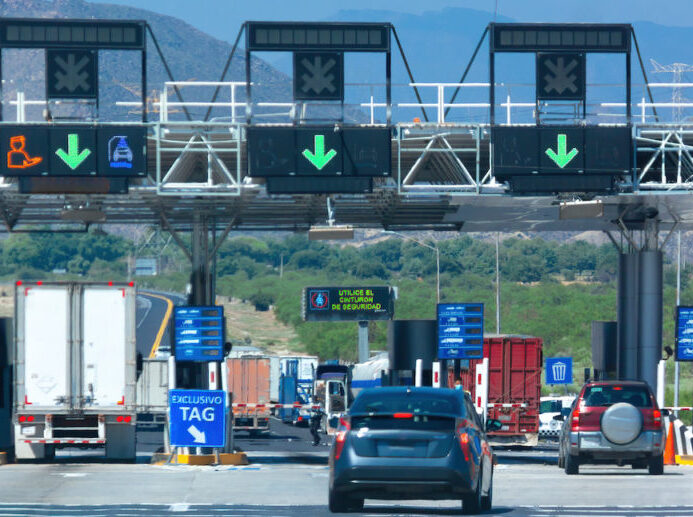 cars at toll booth in highway